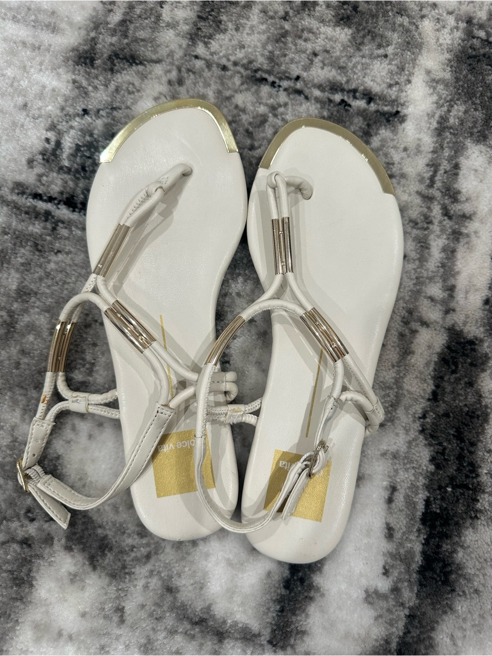 La Dolce Vita Women’s White T-Strap Sandals with Gold Accents
